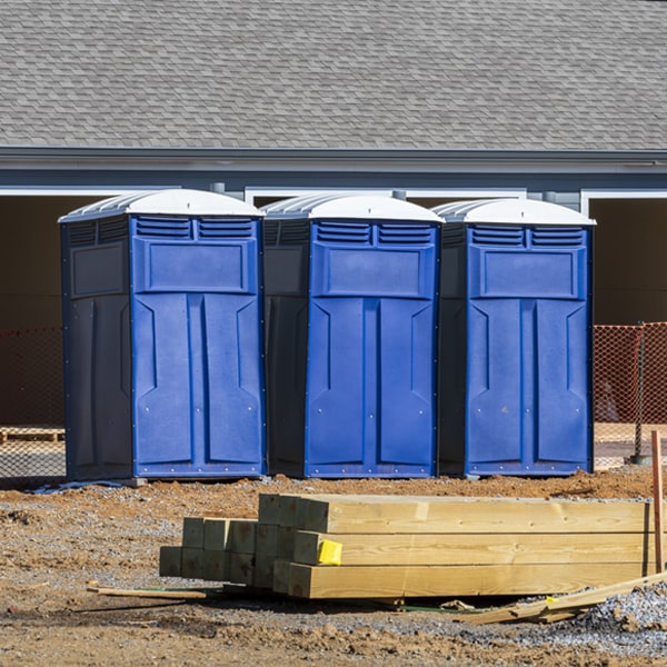 how do you ensure the portable restrooms are secure and safe from vandalism during an event in Ensenada